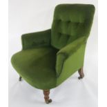 AN EARLY 20TH CENTURY HOWARD & SONS LTD ARMCHAIR stamped "121799223 HOWARD & SONS LTD BERNERS ST" to