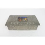A CIGARETTE BOX IN THE STYLE OF LIBERTY & CO TUDRIC PEWTER with embossed Art Nouveau design and