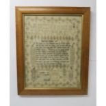 A WILLIAM IV SAMPLER 1833 woven in coloured silks by Ann Rew, with bible psalm, alphabet, trees,