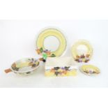 A COLLECTION OF MAK MERRY POTTERY painted with autumnal oranges and red current pattern, including