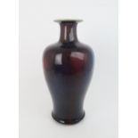 A CHINESE MOTTLED FLAMBE GLAZE BALUSTER VASE 43cm high Condition Report:Uneven footrim