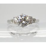 A CLASSIC DIAMOND SOLITAIRE RING set with an estimated approximately 1.05ct diamond, with further
