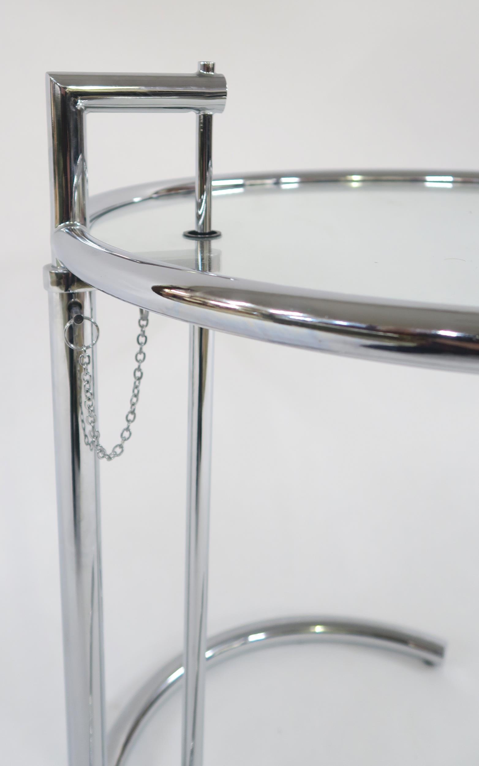 A MID 20TH CENTURY AFTER EILEEN GRAY E-1027 ADJUSTABLE TABLE with circular glass table top on - Image 4 of 4