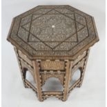 A MIDDLE EASTERN MOORISH EBONY AND BONE INLAID OCTAGONAL TABLE extensively inlaid to top and side