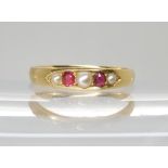 AN 18CT RUBY AND PEARL RING stamped with the makers mark TC possibly Thomas Cooper of Edinburgh 1840