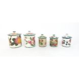A WEMYSS SWEET PEA DECORATED BISCUIT JAR AND COVER a further jar and cover painted with apples,