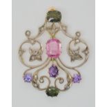 AN EDWARDIAN DIAMOND AND GEM SET PENDANT set with rose cut diamonds, tourmalines and other gems in