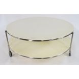 A LATE 20TH CENTURY EHLEN JOHANSSON FOR IKEA "STRIND" TWO TIER COFFEE TABLE with circular white