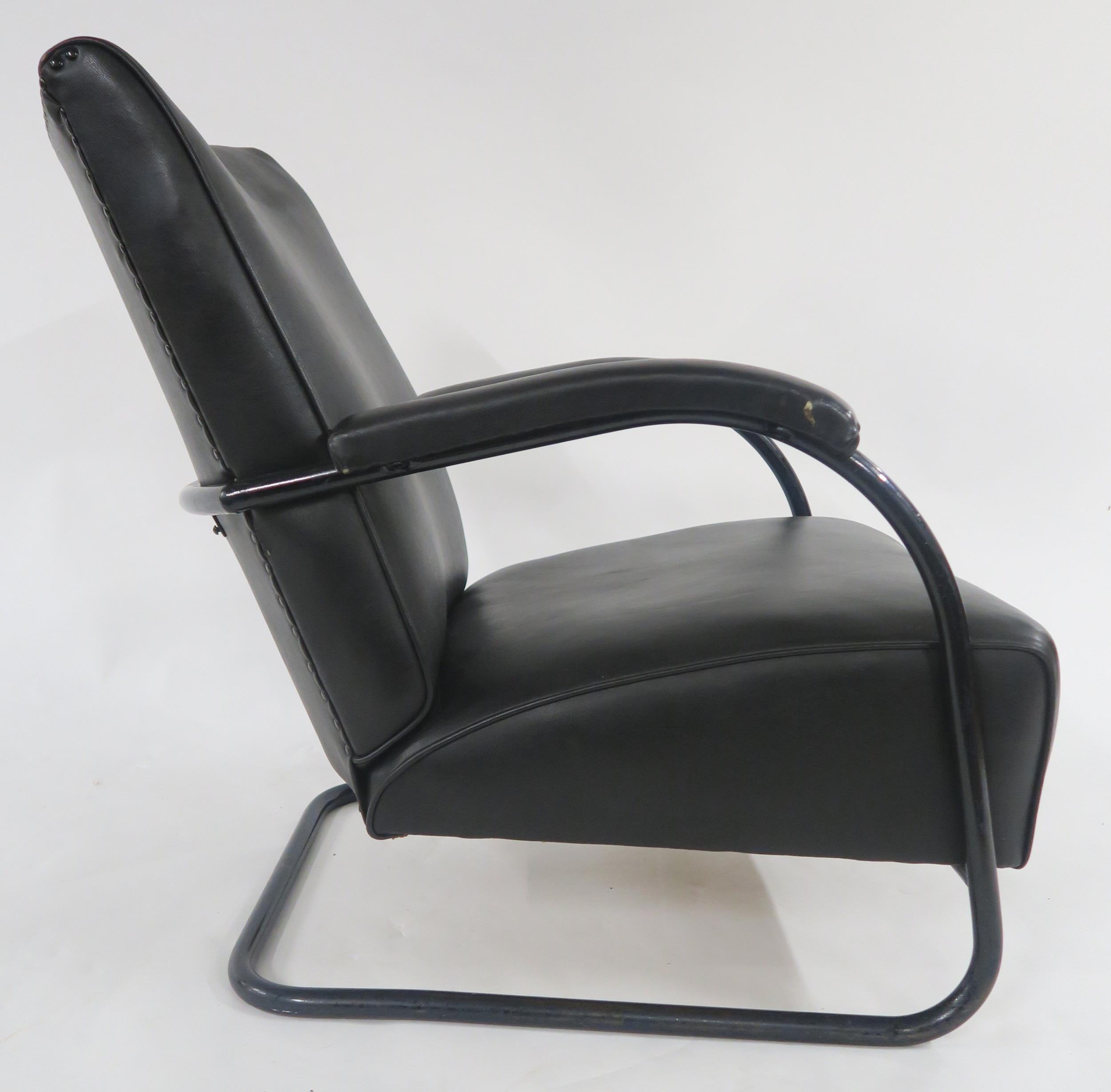 A MID 20TH CENTURY BLACK VINYL CANTILEVER ARMCHAIR with painted tubular steel frame, 83cm high x - Image 3 of 7