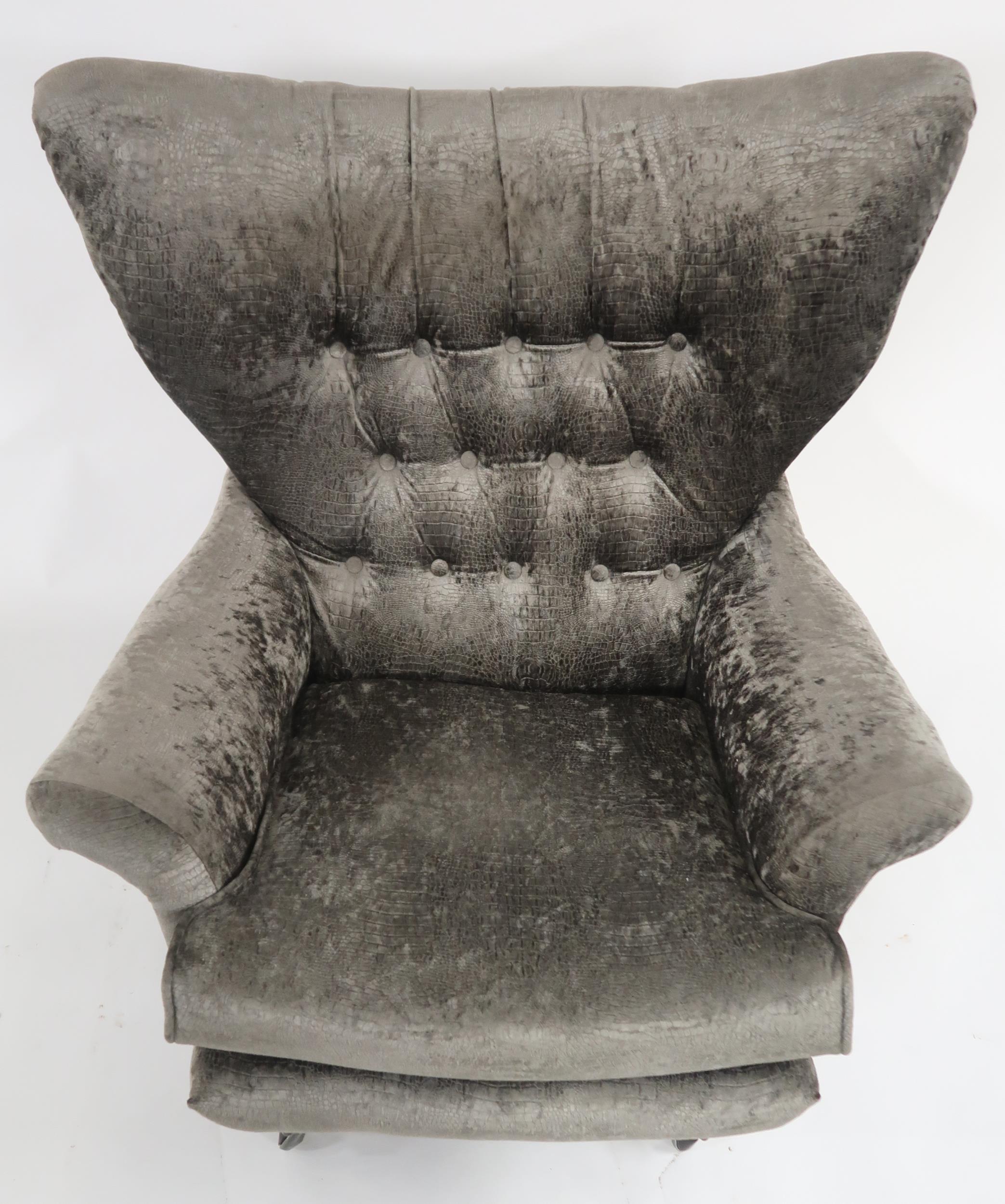 A MID 20TH CENTURY G PLAN MODEL 6250 SWIVEL WING BACK ARMCHAIR upholstered in a grey textured velour - Image 2 of 6