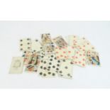 T WHEELER EXPORATION GIII PLAYING CARDS within a straw covered box and decorated with a frigate,