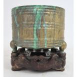 A CHINESE ARCHAIC STYLE BRASS CENSER cast with horizontal bands, seal mark