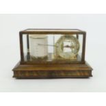A WILLIAM ROBERTSON & SON BAROGRAPH  Within an oak and bevelled glass case, single drawer for