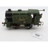 A Hornby 0-gauge locomotive in green LNER livery, with clockwork forward/reverse motor Condition