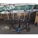 A lot of two contemporary metal plant stands and another metal plant pot stand in the form of a