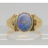 A 9ct gold opal doublet ring, size V, weight 5.8gms Condition Report:Available upon request