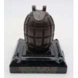 A WW1 British hand grenade converted into an inkwell  Condition Report:Available upon request