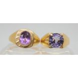 A 9ct gold amethyst ring, size U1/2, and a faux amethyst example, size V, weight together 9.9gms