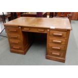 An early 20th oak twin pedestal desk Condition Report:Available upon request