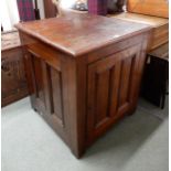 A Victorian stained oak cabinet with panelled single door and sides Condition Report:Available