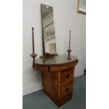 An early 20th century oval topped dressing table with narrow mirror flanked by lamp/candle sconces
