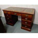 A late Victorian mahogany pedestal writing desk with embossed skiver Condition Report:Available upon