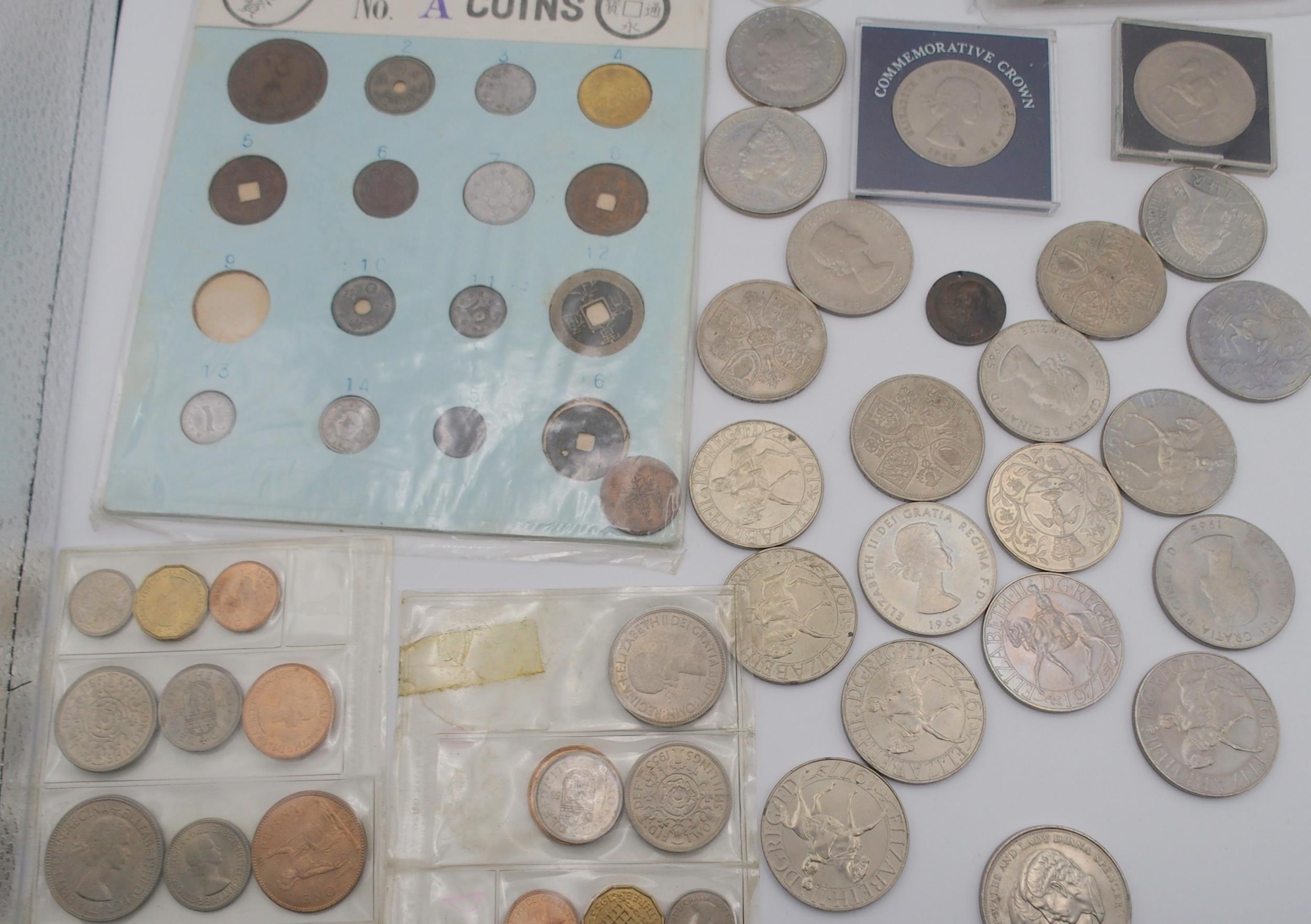 A lot comprising a Japanese coin set, Churchill crowns, various commemorative examples etc Condition - Image 2 of 5