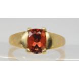 A 9ct gold gents QVC ring set with a red gem, size W1/2, weight 3.7gms Condition Report:Available