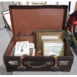 A leather suitcase containing pictures and books on antiques Condition Report:Available upon