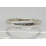 A platinum wedding ring, the shank stamped Pt.97, with inscription dated 1934, size H1/2, weight 2.