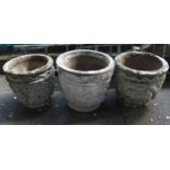 A pair of stoneware garden urns and another similar garden urn (3) Condition Report:Available upon