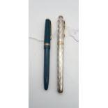 A Montegrappa silver fountain pen, the body with engine turned art deco style decoration, the nib