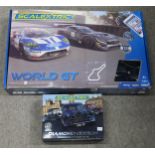 A Scalextric World GT set and a Mini 60 Diamond Edition set of three cars Condition Report:Available