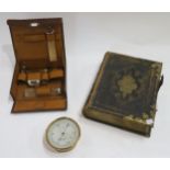 A military compensated barometer by Short & Mason Ltd., London, a family bible and a gentleman's