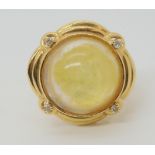 A 14k gold mabe pearl and diamond ring (mabe pearl damaged) finger size N, weight 8gms Condition