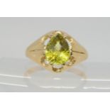 A 9ct ring set with a checkerboard cut bright green gemstone, size U1/2, weight 4.2gms  Condition