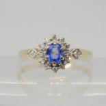 A 9ct gold sapphire and diamond cluster ring, size Q1/2, weight 1.7gms Condition Report:Available