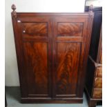 A late Victorian mahogany two door wardrobe Condition Report:Available upon request