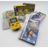 A Nintendo Gameboy Colour, with various games to include Pokemon Yellow (in original box), Pokemon