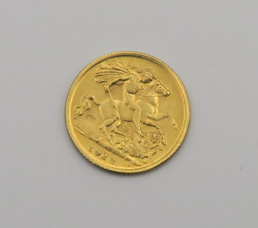 A George V gold half sovereign, 1913 Condition Report:Available upon request