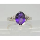 An 18ct white gold amethyst and diamond ring, size P1/2, weight 4gms Condition Report:Available upon