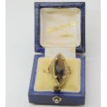 A 9ct gold marquis smokey quartz ring, size Q, weight 4.2gms Condition Report:Available upon