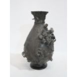 A Japanese bronze vase decorated in relief with a bird and chrysanthemum Condition Report: