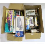 A quantity of boxed toys, to include Corgi trucks and buses, Scalextric etc. Condition Report: