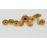 A collection of gold shirt studs,2 x 18ct 1.6gms,3 x 15ct 4.3gms, and 4 x 9ct 3.4gms Condition