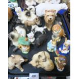 A collection of Beswick figures including a polar bear, Siamese cats and kittens, Beatrix Potter