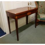 A Victorian mahogany and satinwood inlaid fold over tea table Condition Report:Available upon