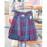 A child kilt and matching tie Condition Report:Not available for this lot