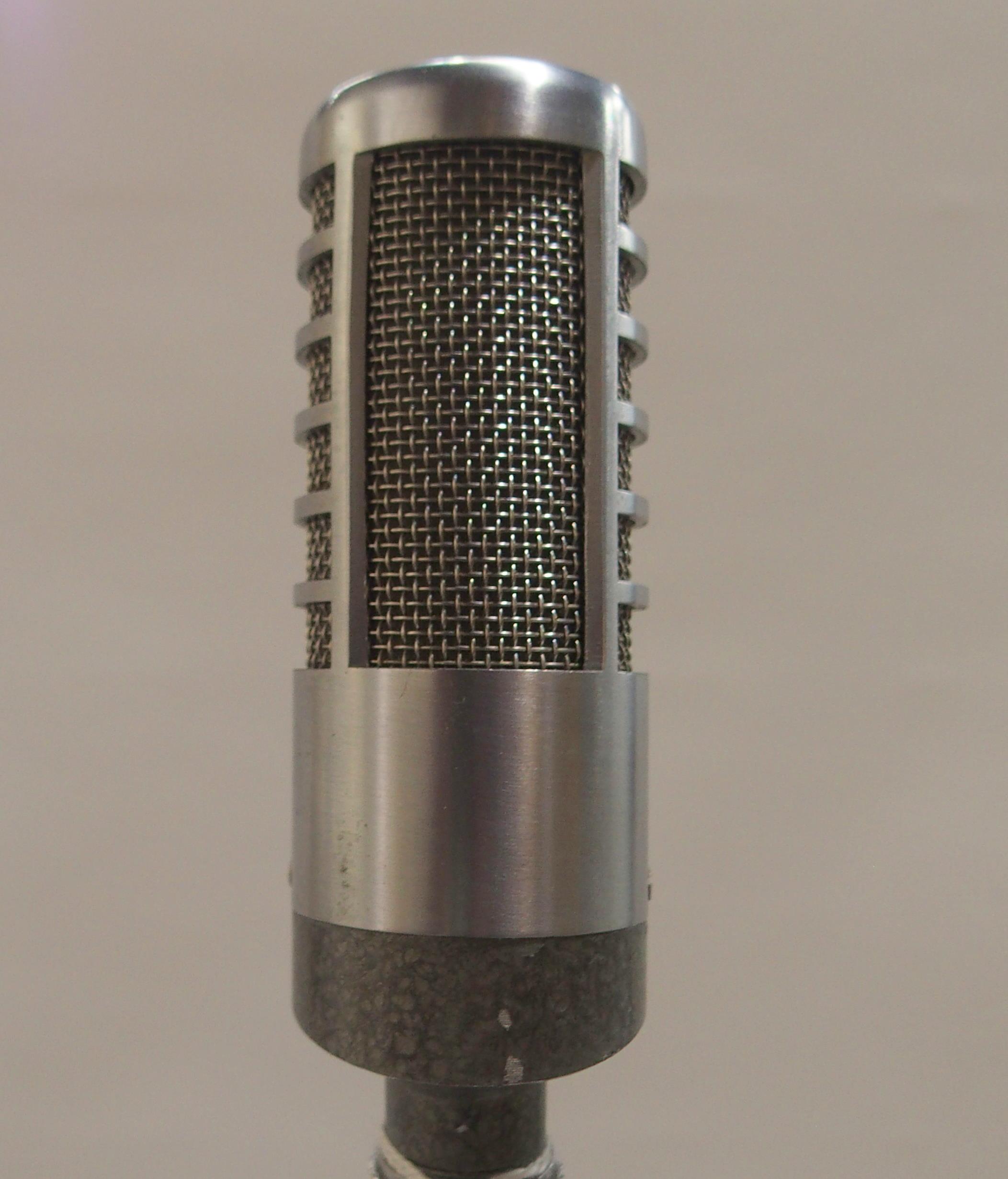 A vintage ribbon microphone and stand Condition Report:Available upon request