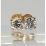 A pair of 9ct gold  diamond stud earrings, set with two estimated approx 0.375ct diamonds with